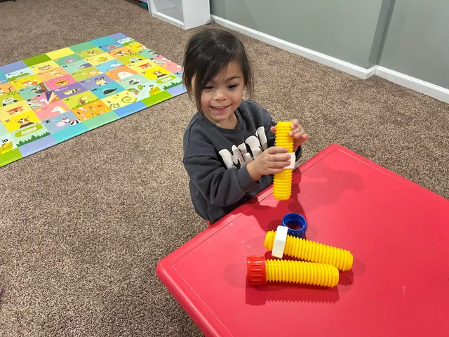 Children enjoying activities at Patty's Little Angels Childcare